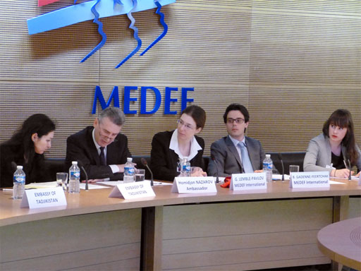 Photo of conference and MEDEF logo